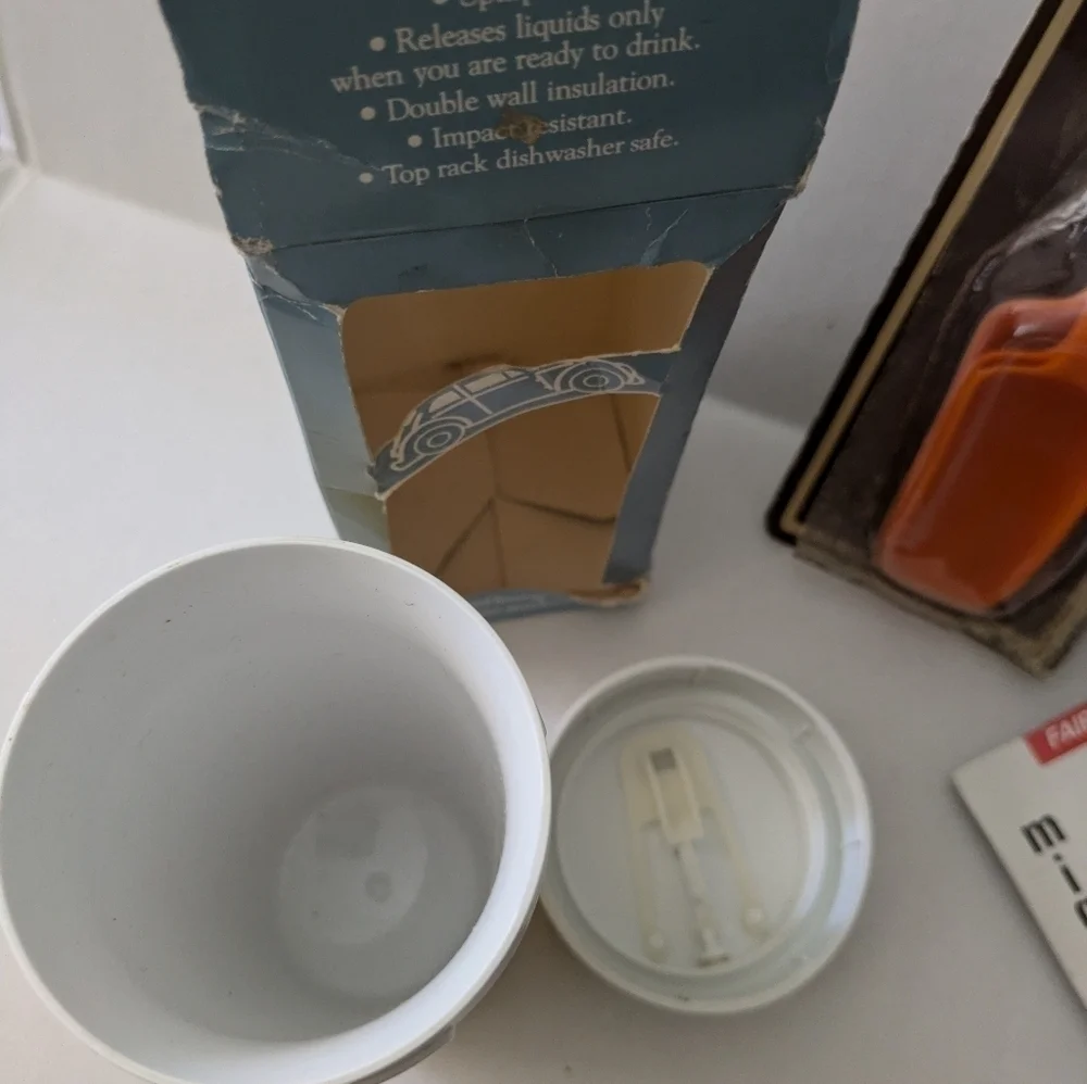 Vintage New Old Stock kitchen gadgets, cup, pitcher,etc.
